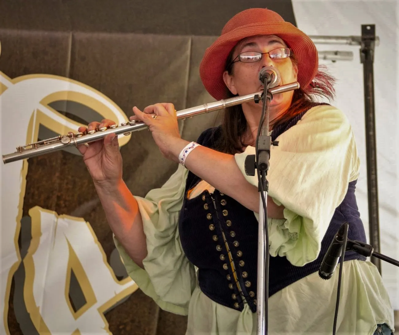 Jean Marie Learman performing flute in period costume